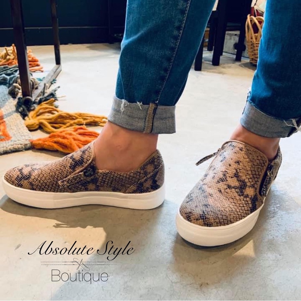 Very G brand slip on sneakers with side zip and snake skin pattern.
